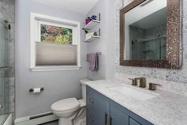 bathroom with vanity, toilet, a shower with door, and baseboard heating
