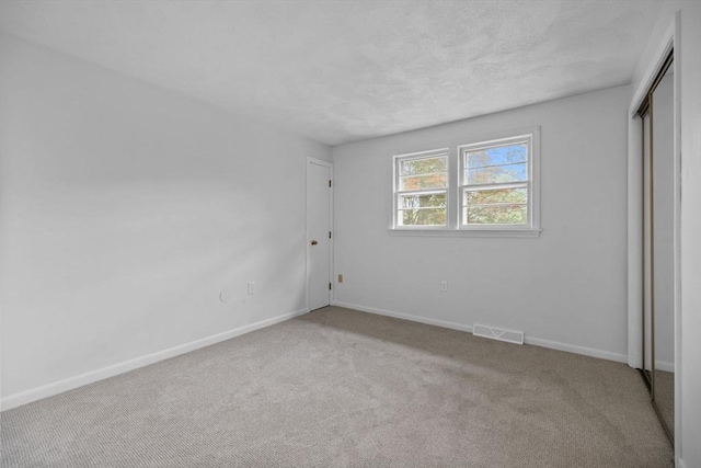 23 Eastview Ave, Billerica, MA 01821 - unfurnished bedroom featuring carpet and a closet