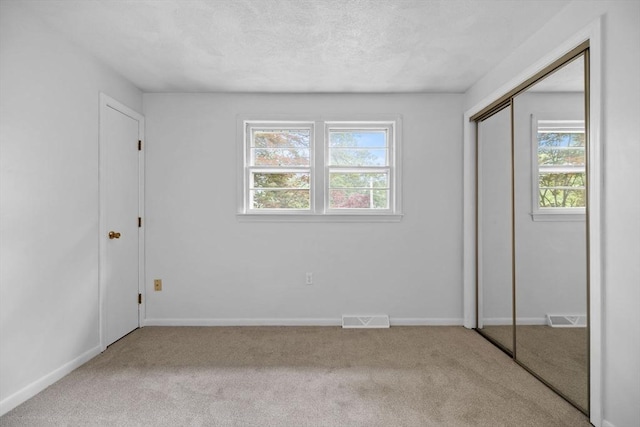 23 Eastview Ave, Billerica, MA 01821 - unfurnished bedroom featuring carpet flooring and a closet