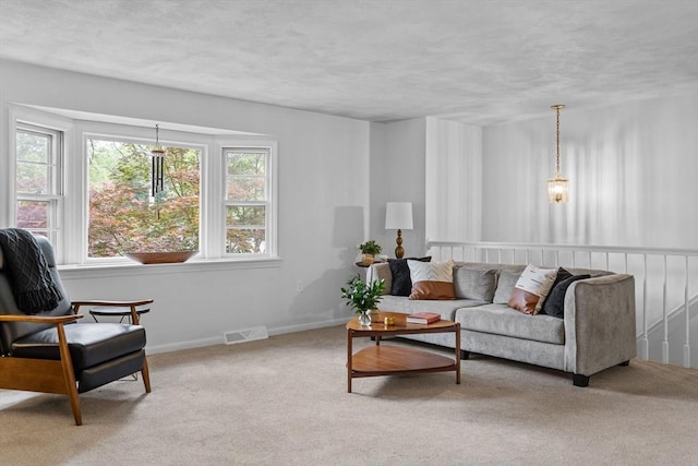 23 Eastview Ave, Billerica, MA 01821 - living area with carpet flooring and a textured ceiling