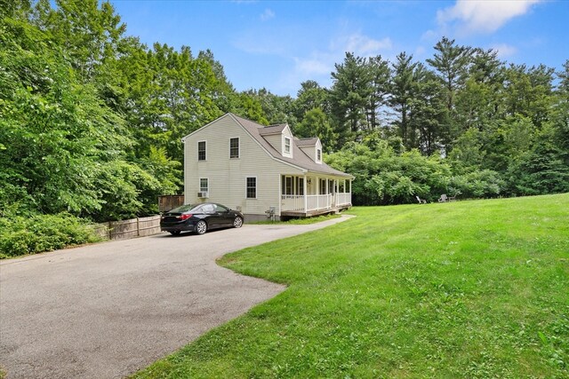 view of home's exterior featuring a yard