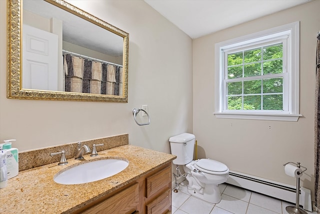 bathroom with vanity, a baseboard radiator, toilet, and tile patterned flooring