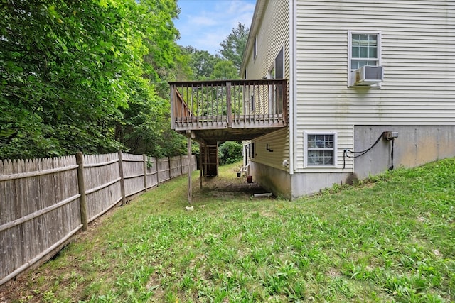 view of yard with a deck and cooling unit