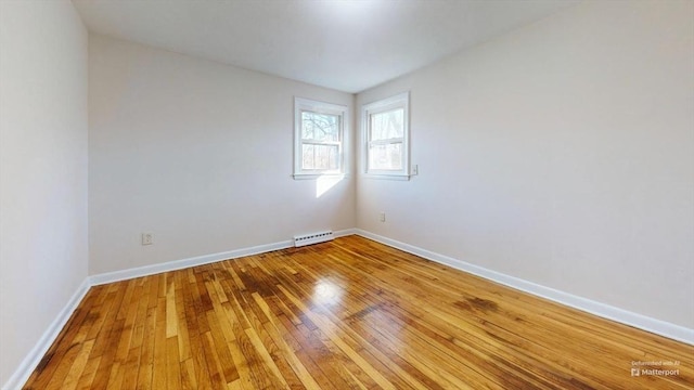 empty room featuring hardwood / wood-style floors