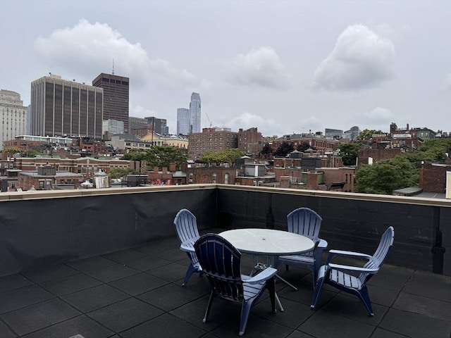 view of patio / terrace with a balcony