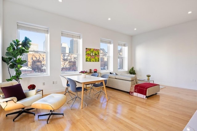 living area with light hardwood / wood-style floors