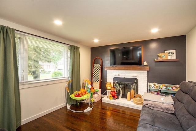 36 Pratt St, Brockton, MA 02302 - living area featuring wood finished floors, a fireplace, baseboards, and recessed lighting
