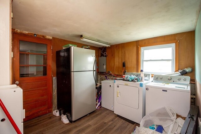 36 Pratt St, Brockton, MA 02302 - laundry room with washing machine and clothes dryer, electric panel, wood finished floors, and wood walls