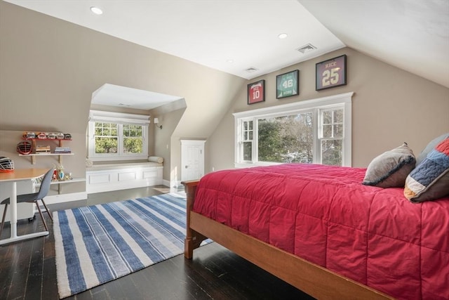 bedroom with baseboards, visible vents, wood finished floors, vaulted ceiling, and recessed lighting