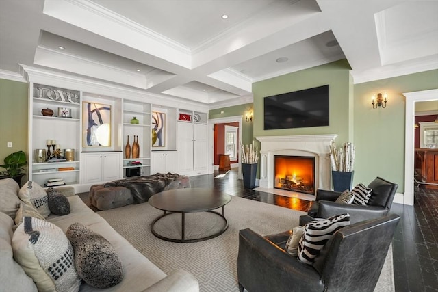 living area featuring wood finished floors, coffered ceiling, crown molding, and a high end fireplace