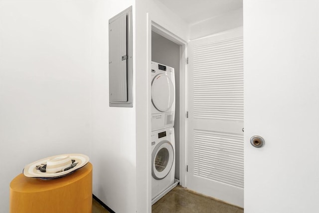 437 D St Unit 4F, Boston, MA 02210 - washroom with stacked washer and clothes dryer and electric panel