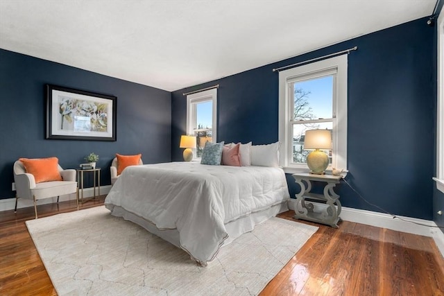 bedroom featuring wood-type flooring