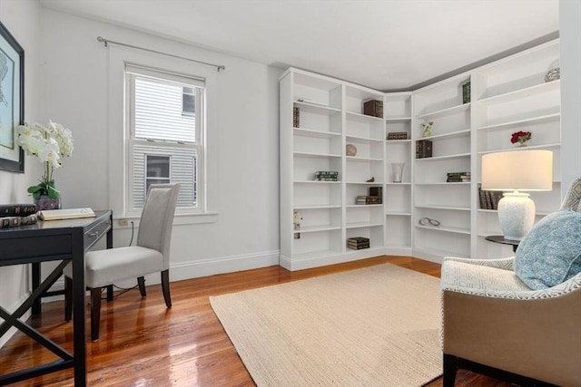 sitting room with hardwood / wood-style floors