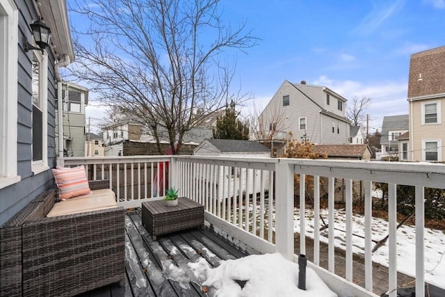 view of snow covered deck