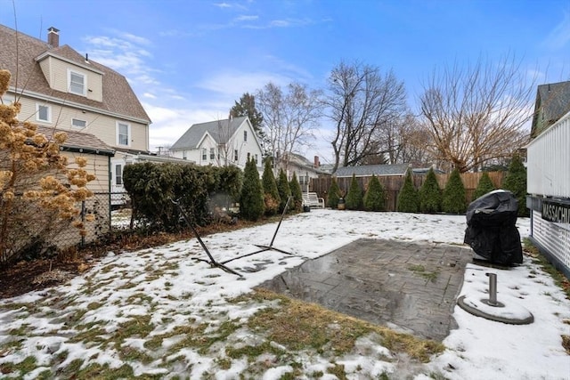 view of snow covered patio