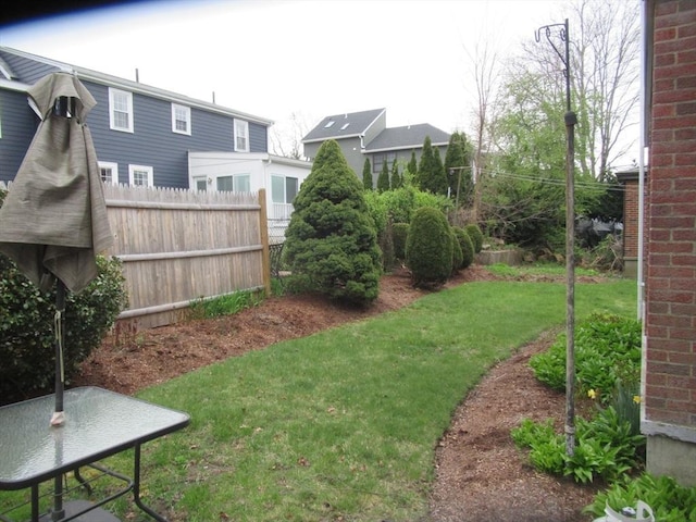 view of yard with fence