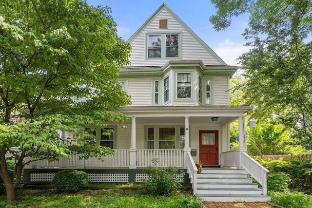 18 Milton Rd, Brookline, MA 02445 - view of front of property with a porch