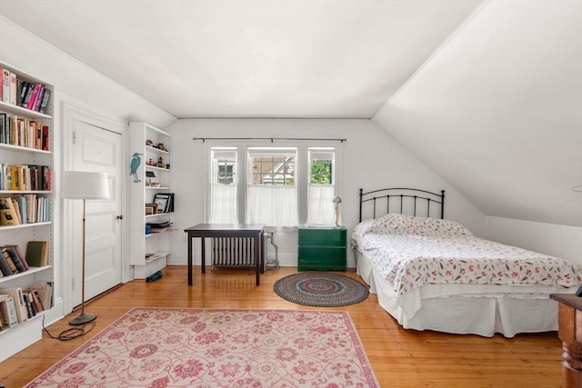 18 Milton Rd, Brookline, MA 02445 - bedroom featuring lofted ceiling and hardwood / wood-style flooring