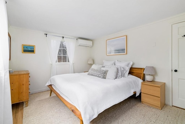 bedroom with ornamental molding and a wall mounted air conditioner