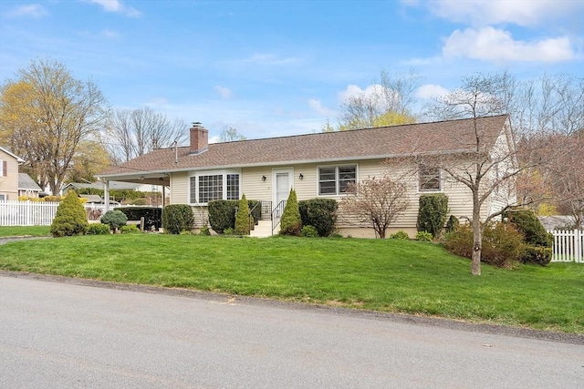 single story home featuring fence, a chimney, and a front lawn