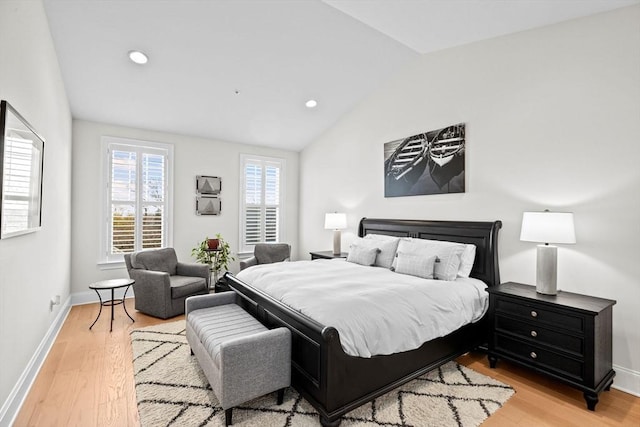 bedroom with recessed lighting, baseboards, vaulted ceiling, and light wood finished floors