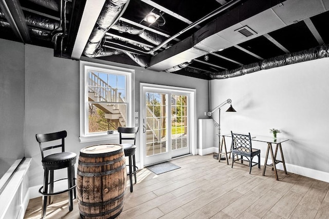 interior space with visible vents and a wooden deck