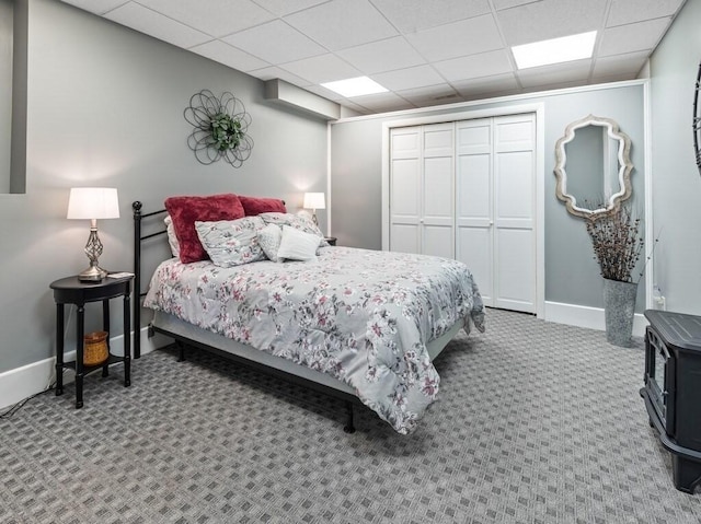 101 Colonial Dr Unit 101, Sturbridge, MA 01566 - carpeted bedroom with a closet, a paneled ceiling, and baseboards