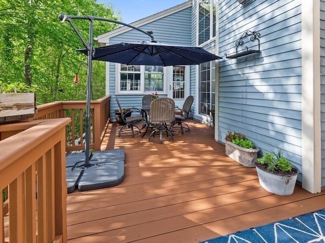 101 Colonial Dr Unit 101, Sturbridge, MA 01566 - wooden deck featuring outdoor dining space
