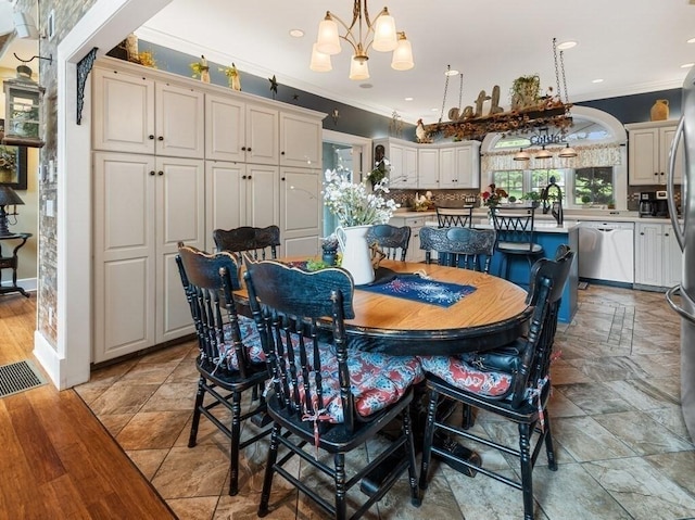 101 Colonial Dr Unit 101, Sturbridge, MA 01566 - dining area featuring a chandelier, ornamental molding, and recessed lighting