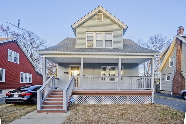 bungalow-style house featuring covered porch