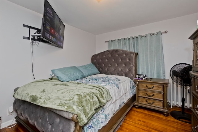 bedroom featuring wood-type flooring