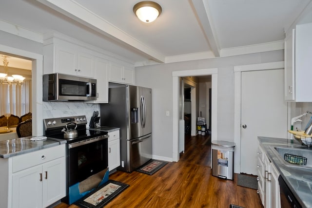 kitchen featuring white cabinetry, dark hardwood / wood-style flooring, beamed ceiling, and stainless steel appliances