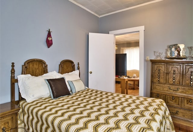 bedroom featuring crown molding