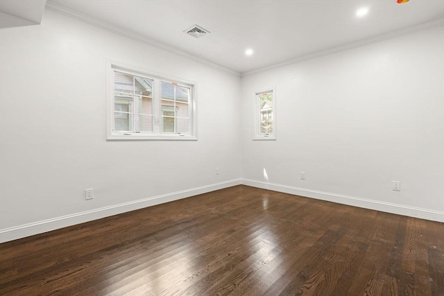 21 Greystone Rd Unit 2, Malden, MA 02148 - unfurnished room with ornamental molding, dark wood-type flooring, and recessed lighting