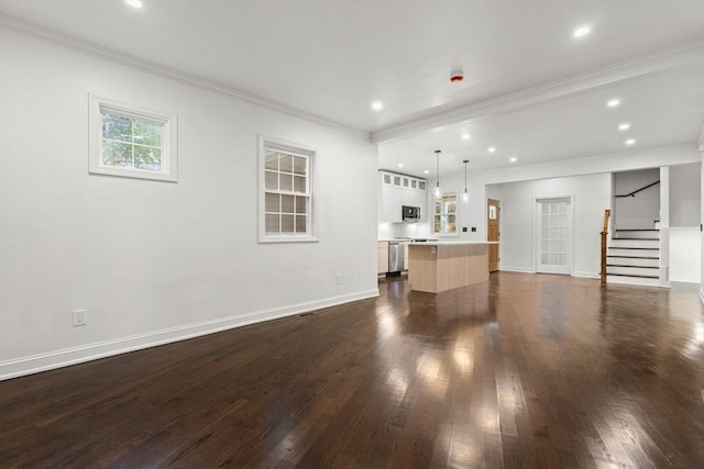21 Greystone Rd Unit 2, Malden, MA 02148 - unfurnished living room with dark wood-type flooring, ornamental molding, stairs, and recessed lighting