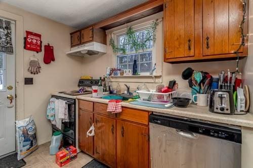 kitchen with stainless steel dishwasher, sink, and electric range