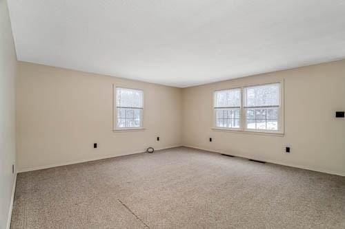 empty room with light carpet