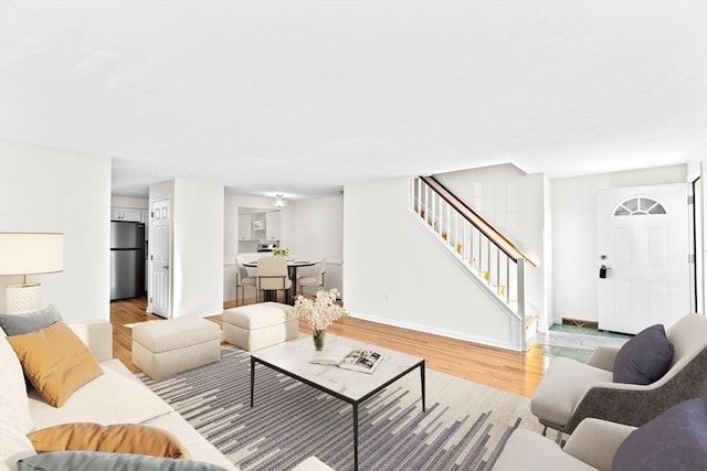 living room with light hardwood / wood-style floors