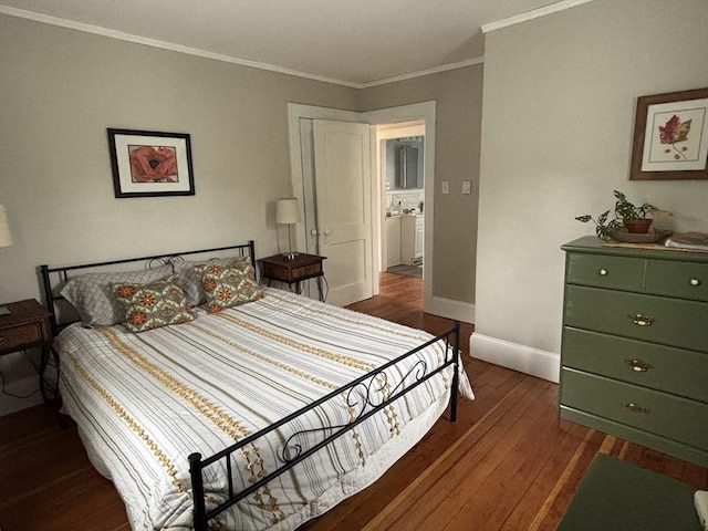 bedroom with crown molding, dark wood-type flooring, and baseboards