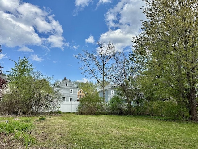 view of yard with fence