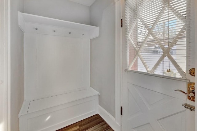 mudroom featuring dark wood-style floors and baseboards