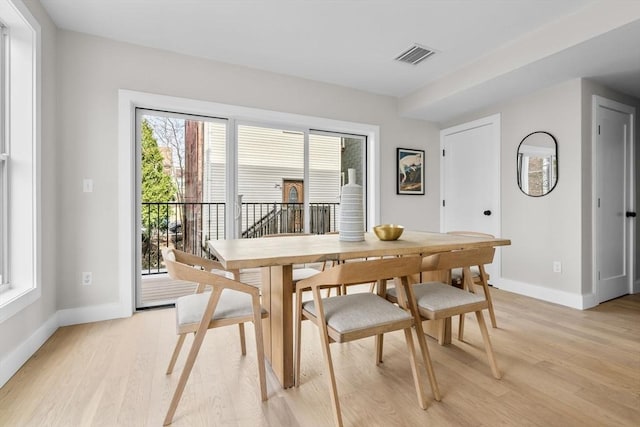 220 Bowen St Unit 2, Boston, MA 02127 - dining space featuring baseboards and light wood finished floors