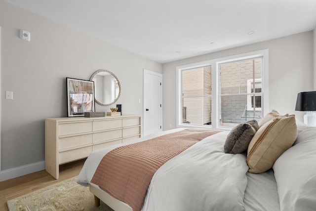 220 Bowen St Unit 2, Boston, MA 02127 - bedroom featuring light wood-style flooring and baseboards