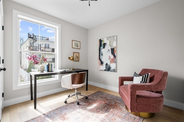 220 Bowen St Unit 2, Boston, MA 02127 - office with baseboards and wood finished floors