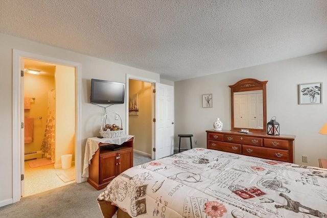 carpeted bedroom with ensuite bath, a baseboard radiator, and a textured ceiling