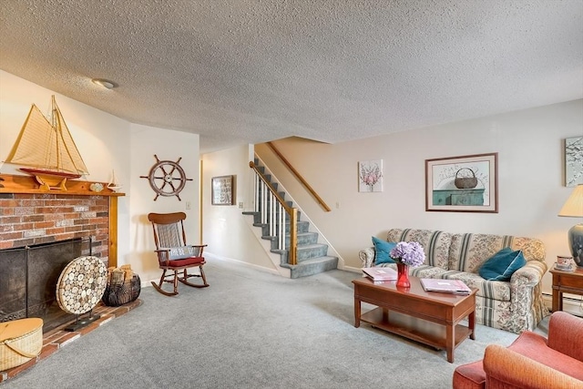 carpeted living room featuring a fireplace and a textured ceiling