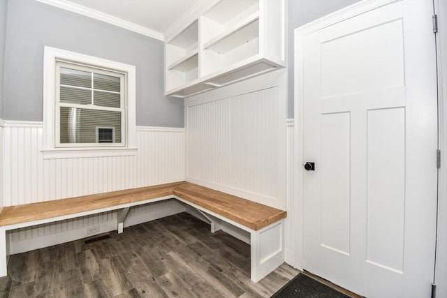 mudroom featuring a wainscoted wall, ornamental molding, and wood finished floors