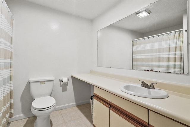 35 Prospect St Unit 313, Woburn, MA 01801 - full bathroom with vanity, toilet, and baseboards