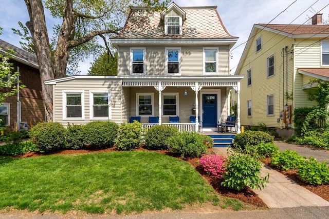 50 Walnut St, Northampton, MA 01060 - victorian home featuring a porch and a front lawn