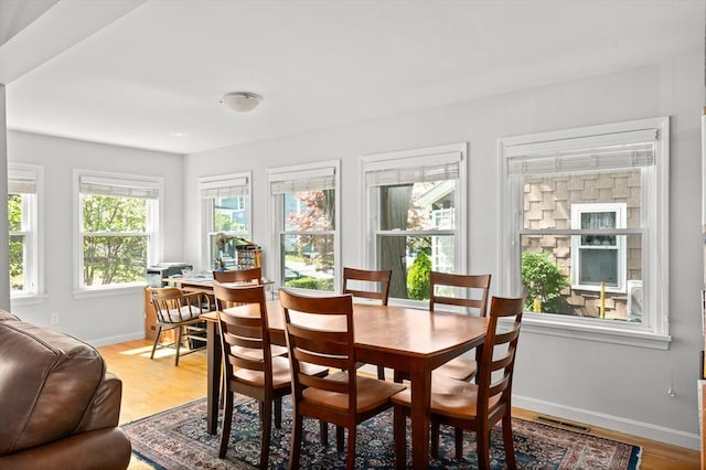 50 Walnut St, Northampton, MA 01060 - dining room with baseboards and light wood-style flooring